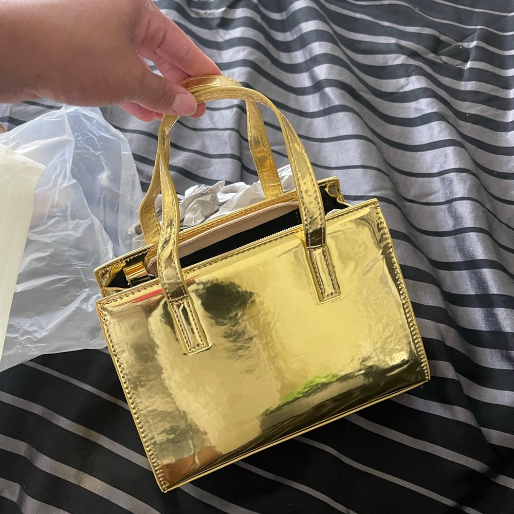 Metallic gold cross body purse never worn